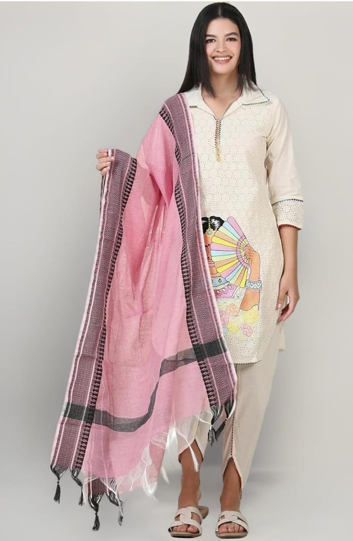 Woman wearing off-white embroidered cotton kurti with hand block print, holding a pink handwoven dupatta