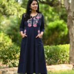 Three stylish young women showcasing 2025 fashion trends — featuring ethnic co-ord sets, modern saree drapes, and oversized chic shirt dresses.